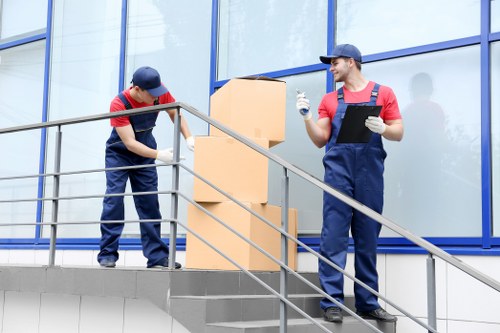 Professional removals and storage services in St Helier with moving boxes and transport