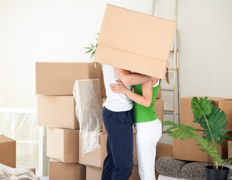Packed boxes and furniture prepared for a St Helier removal service
