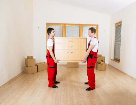 Household items and furniture organized for a St Helier move